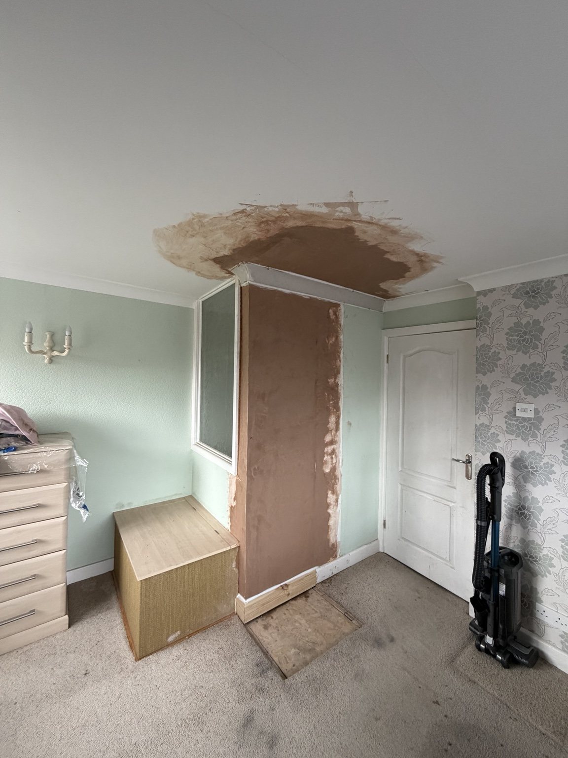 Fireplace removed and wall reinstated